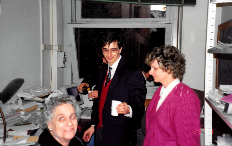 Celebrations for graduation in the small researcher office at the University of Rome La Sapienza, with mother and grandmother