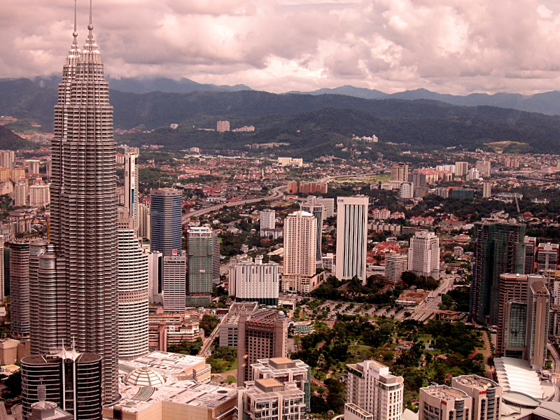 View of the Petronas towers, for many years the tallest skyscraper in the world (452 m), from the telecommunication tower, Kuala Lumpur, Malaysia